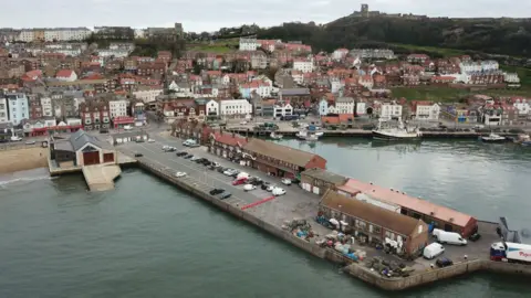 An aerial view of the harbour and pier in Scarborough.