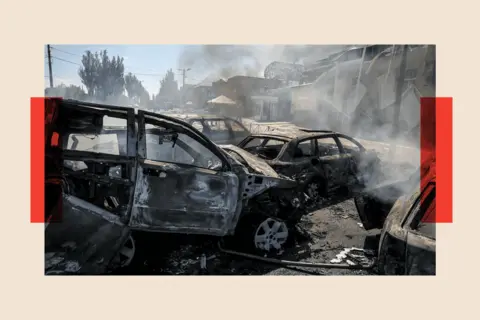 PRESS SERVICE OF THE 24 MECHANIZED BRIGADE HANDOUT/EPA/Shutterstock The site of a Russian drone strike on a market in the frontline city of Druzhkivka in the Donetsk region, Ukraine,