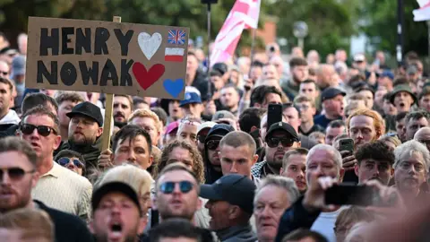 Finnbarr Webster via Getty Images People attend a protest about the police's handling of the arrest of Henry Nowak at Southampton Central Police Station on 2 June 2026 in Southampton, England. 