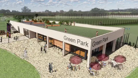 A computer-generated image from above, showing a pavilion building with football pitches surrounding it. The building is white and modern, with glass windows and some outdoor benches with umbrellas over them. CGI people are walking around the pavilion.