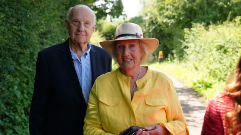 Dawid Wojtowicz/BBC Ian McKay and Dianne McKay arrive at Stocking Farm