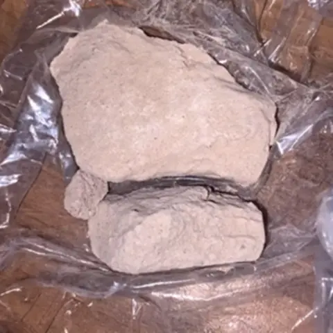 Nottinghamshire Police Brown rocks of heroin have been wrapped in clingfilm