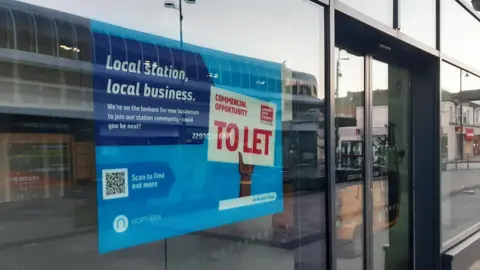 A To Let sign at the entrance to Sunderland's railway station.