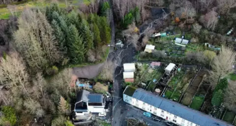 Reuters Aerial pictures showed the extent of damage caused by the Cwmtillery coal tip slide in November 2024