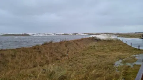 Golspie Golf Club High tide and waves at Golspie