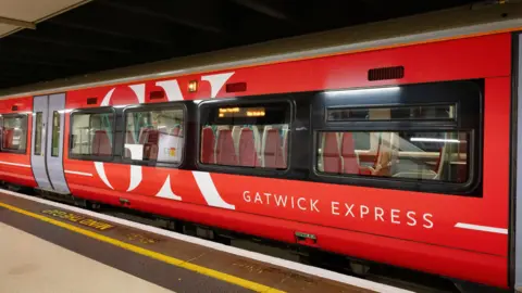 Getty Images A red Gatwick Express Train at Victoria Station in London