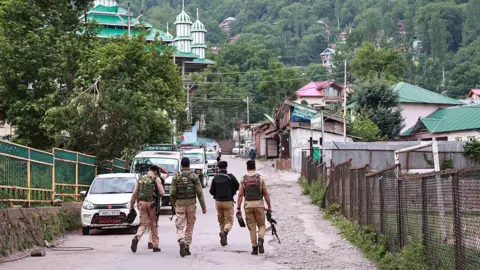 NurPhoto via Getty Images Indian security forces are on the LoC sector in Uri, Jammu and Kashmir, India, on May 7, 2025. Many civilians are injured on the Indian side after their house is hit by Pakistani shelling in Baramulla district. The Indian military says early Wednesday it launches strikes against Pakistan in retaliation for last month's militant attack in Pahalgam, Jammu and Kashmir. (Photo by Nasir Kachroo/NurPhoto via Getty Images)