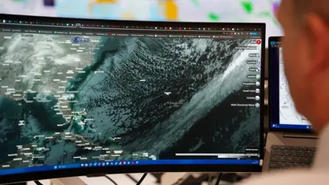 PA Another weather map but of a more satellite view perspective on the computer screen. 