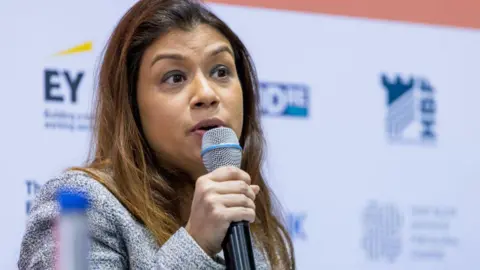 Getty Images Tulip Siddiq speaking into microphone