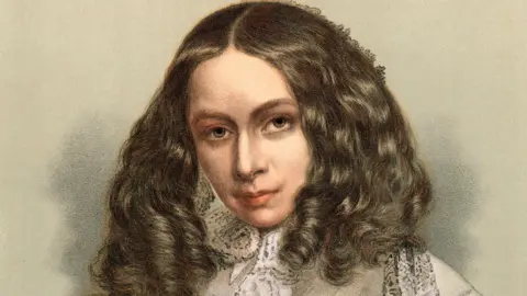 A portrait painting of a woman with long, styled hair, wearing a light-coloured jacket or dress with ornate floral decoration.