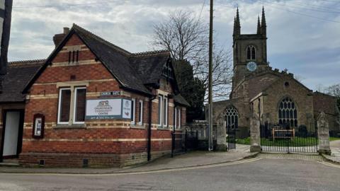 The Church Gate Community Centre sits outside Saint Mary's Church in Lutterworth