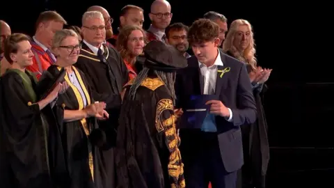 University of Nottingham Charlie Webber accepting a posthumous degree