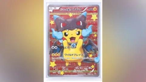 Hansons Auctioneers Japanese XY Promo, Pretend Mega Charizard X Pikachu (Poncho Pikachu), 207/XY-P. Originally found in the Mega Charizard X Poncho Special Box
