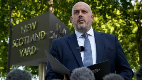 PA Media Head of Counter Terrorism Policing, Assistant Commissioner Laurence Taylor, reads a statement on the investigation into the death of Ann Widdecombe outside New Scotland Yard, central London.