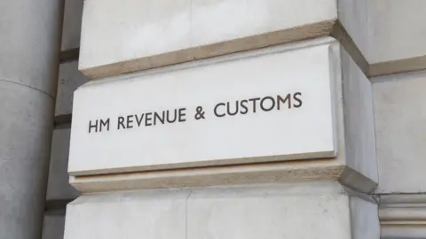 Getty Images A white stone building that says HM Revenue & Customs.