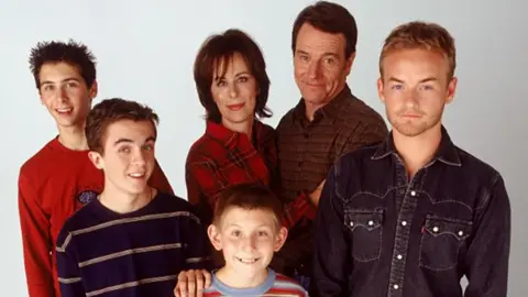  Reese (Justin Berfield), Malcolm (Frankie Muniz), Dewey (Erik Per Sullivan), mom Lois (Jane Kaczmarek), dad Hal (Bryan Cranston) and Francis (Christopher Kennedy Masterson)