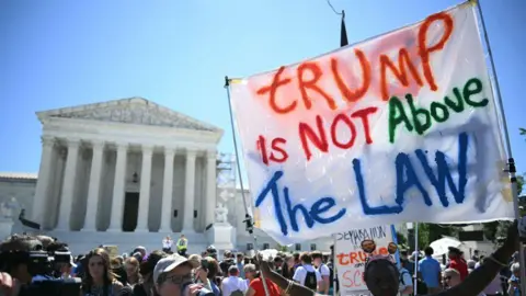Protesters outside the Supreme Court in Washington after judges rule Donald Trump has immunity from prosecution for "official acts"