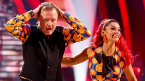 BBC/PA Chris McCausland with his professional dancer Diane Buswell