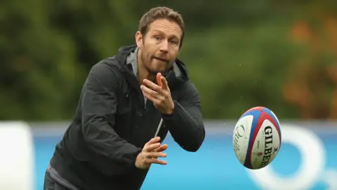 Jonny Wilkinson, the former England international passes the ball during the England captain's run at Pennyhill Park on November 9, 2018 in Bagshot, England. 