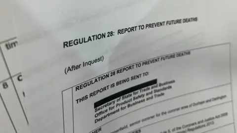 BBC A close-up of the Prevention of Future Deaths report. Essay with text on the topic reads: "Rule 28: REPORT TO PREVENT FUTURE DEATHS"