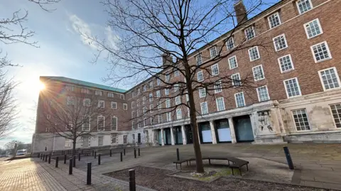 BBC County Hall in Nottinghamshire, a five-storey red-brick building with trees in the foreground