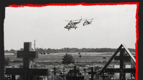 Getty Images: Russian military helicopters fly near a cemetery near a military airfield outside Taganrog, Rostov in July 2022. 