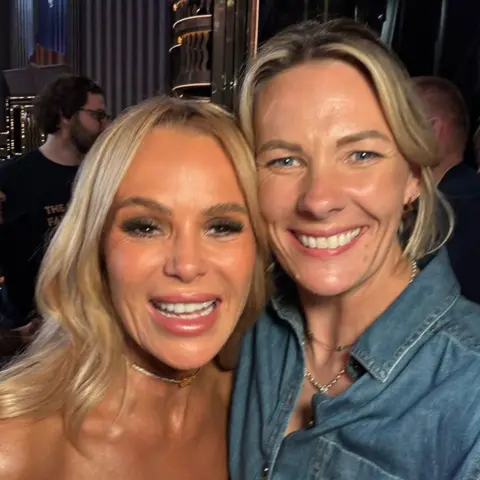 Katryna Shell Close-up selfie of Amanda Holden and Katryna Shell. Both women have blonde hair.