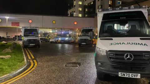 several ambulances parked outside Aberdeen Royal Infirmary's A&E department