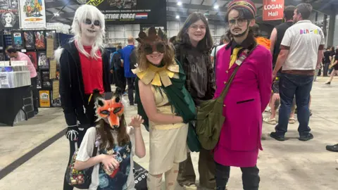 A group of friends in cosplay