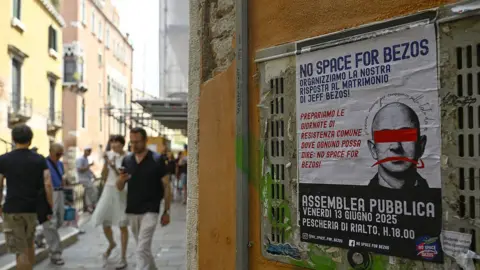 Getty Images An anti-Jeff Bezos poster in a Venice street