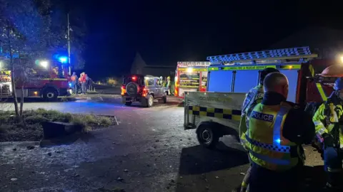 Furness Coastguard Emergency services including police, the fire service and coastguard at the scene at Windermere