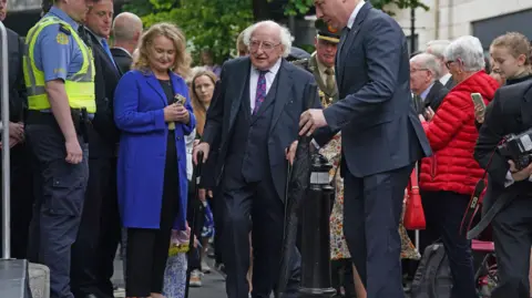 PA Irish president Michael D Higgins arrives at the wreath-laying ceremony