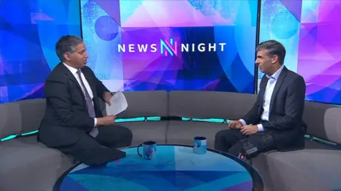 BBC's Faisal Islam opposite former UK PM Rishi Sunak on Newsnight.