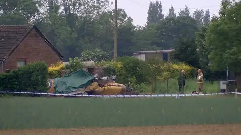 BBC/Jake Zuckerman Scene of Spitfire crash in a field in Coningsby