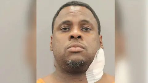 Houston Police Department Chester Lamar Grant mugshot shows bandaged neck
