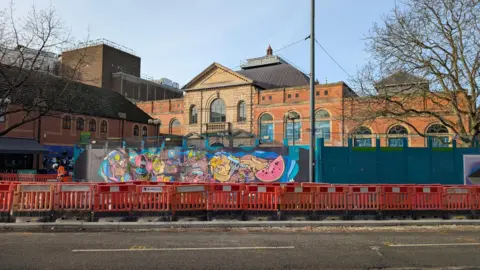 Derby Market Hall with fencing outside