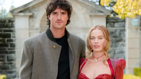 Jacob Elordi and Margot Robbie attend the "Wuthering Heights" Global Junket Photocall at Greystone Mansion on January 28, 2026 in Beverly Hills, California