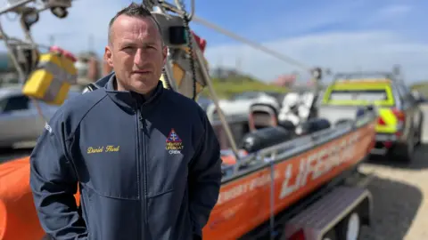 Martin Giles/BBC Coxswain Daniel Hurd