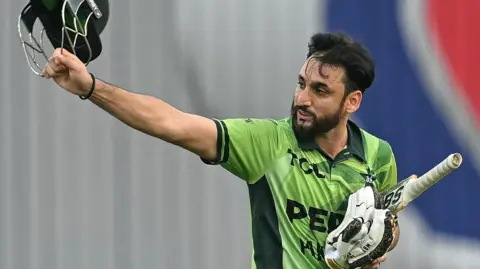 Pakistan batter Salman Agha throws his helmet in anger after being run out for 64 in the second ODI against Bangladesh in Dhaka