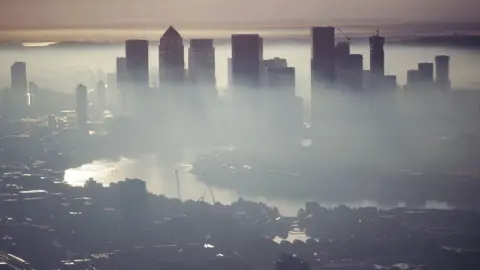 PA Media Misty London skyline during sunrise