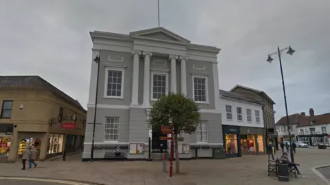 Google Maps A Google street view image of Sudbury Registration Office - a large, grand-looking grey building in the town centre. 