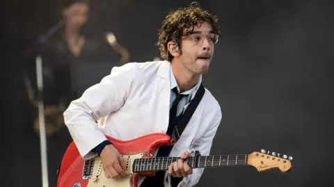 PA The 1975 performing on the main stage at the Trnsmt Festival at Glasgow Green in Glasgow.