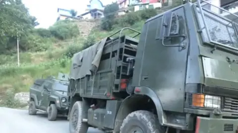 ANI Vehicles of security forces seen in Doda