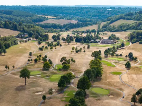 Getty Images Golfers on the green at Woldingham Golf Club on July 25, 2026 in Woldingham, United Kingdom.