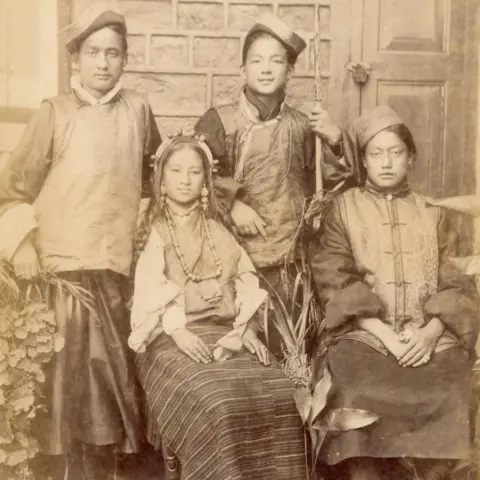 DAG Four men and women belonging to north eastern India's Bhutia community pose in their traditional attire in this picture taken in 1890.