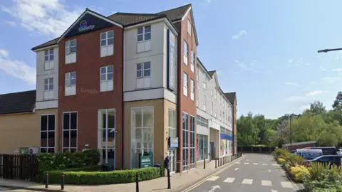 The Travelodge in Spalding. It is a three-storey hotel building.