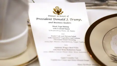 Getty Images The dinner menu during a meeting between US President Donald Trump and business leaders in Japan