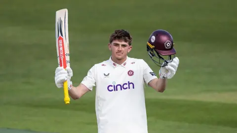Northants' James Sales celebrates reaching his century against Middlesex