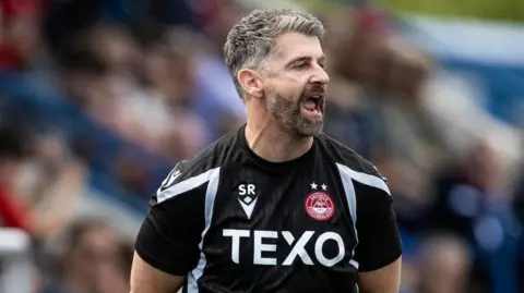 Aberdeen Manager Stephen Robinson during a pre-season friendly match between Cove Rangers v Aberdeen at the Balmoral Stadium, on June 27, 2026, in Aberdeen, Scotland. 