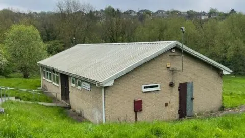 Danielle Andrews/LDRS The building which hosts Rotherham Blackburn Club - a small space constructed from bricks with a corrugated plastic roof.